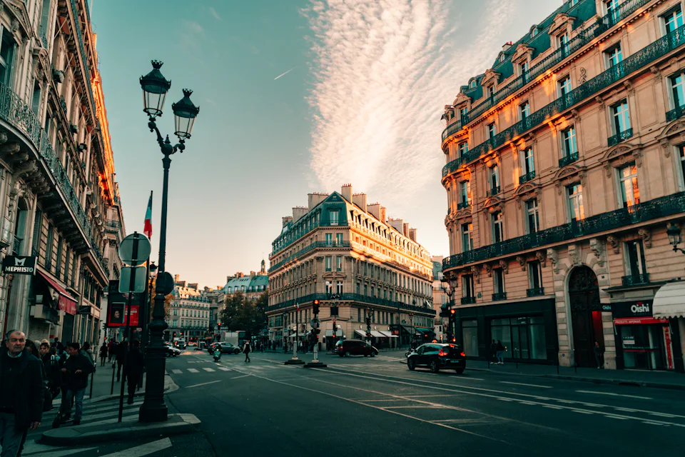 A Haussmann-style street in Paris at sunset